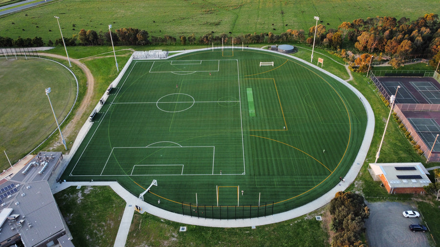 Aerial view of synthetic turf sports field with soccer and multi-sport markings