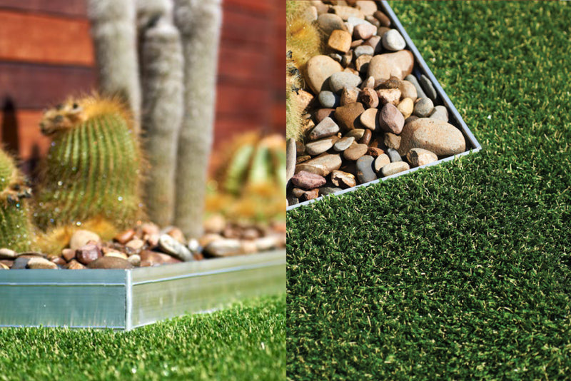 DIY garden edging separating synthetic turf from rocks and cactus landscaping